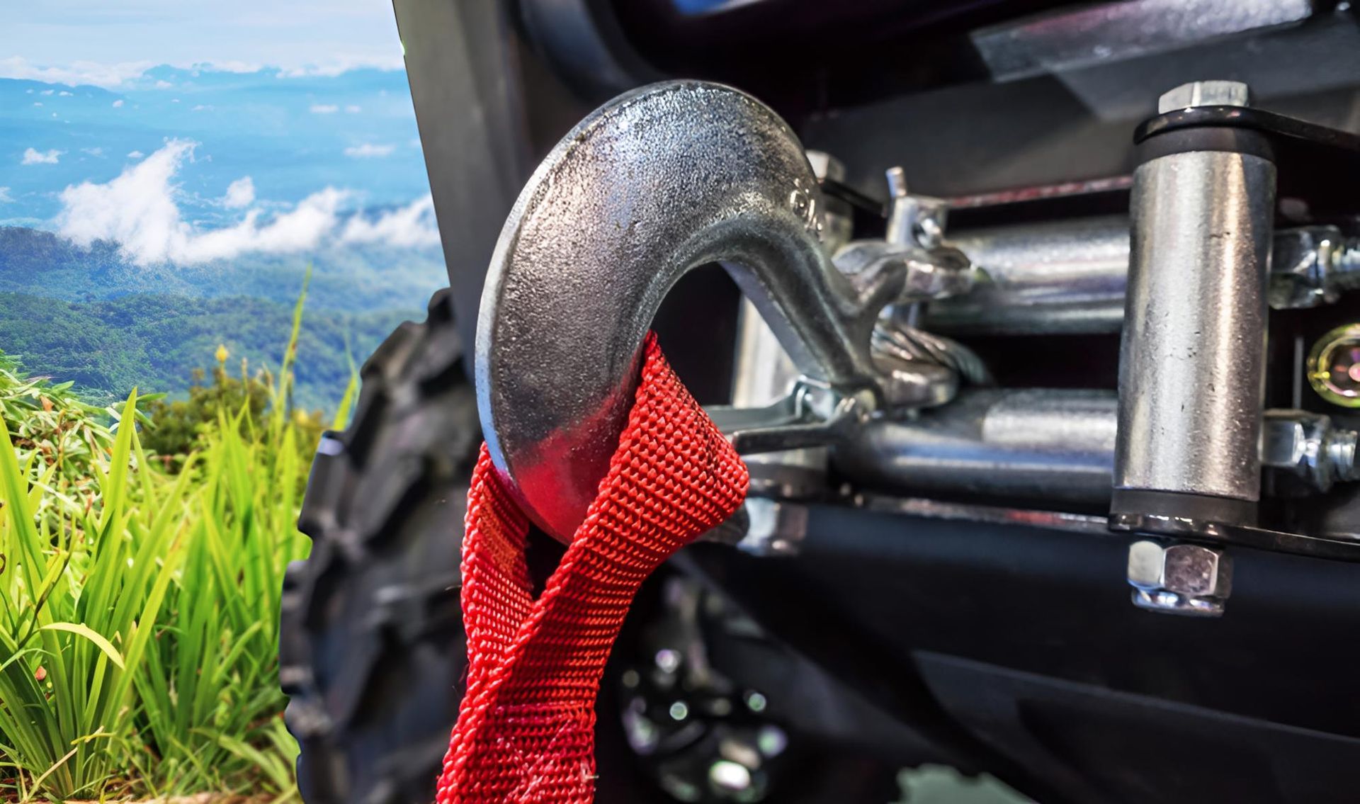 A close up of a winch hook with a red rope attached to it. — Wilson's Towing In Withcott, QLD