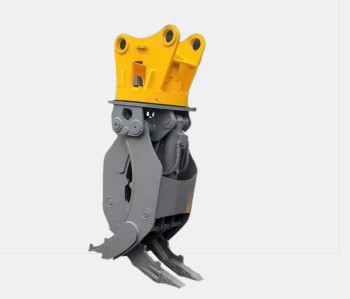Gray and yellow excavator grapple for grabbing and moving materials.