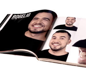 A book is open to a page that says rogelio