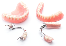 A close up of a pair of dentures on a white background