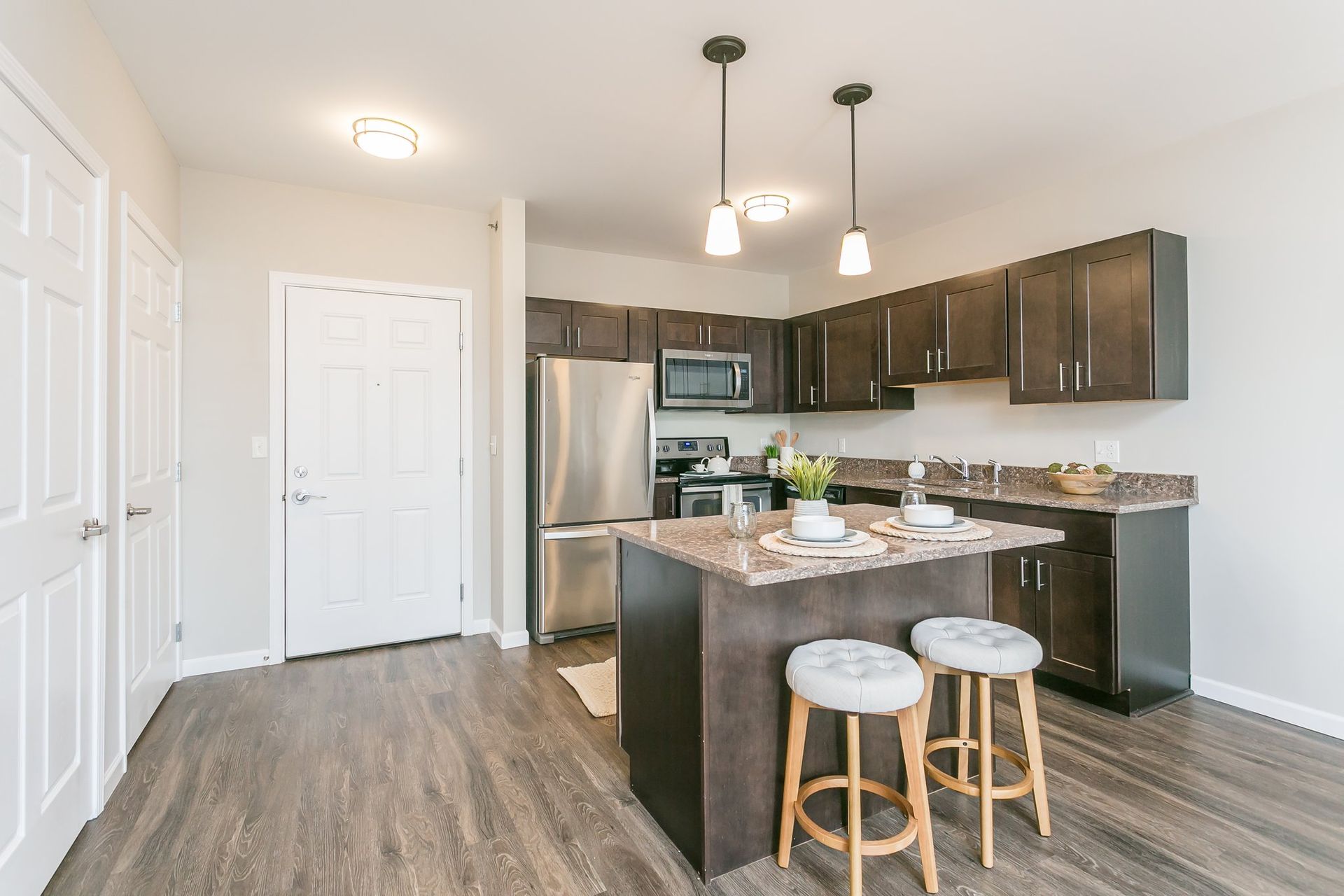 Kitchen with stainless steel appliances and island