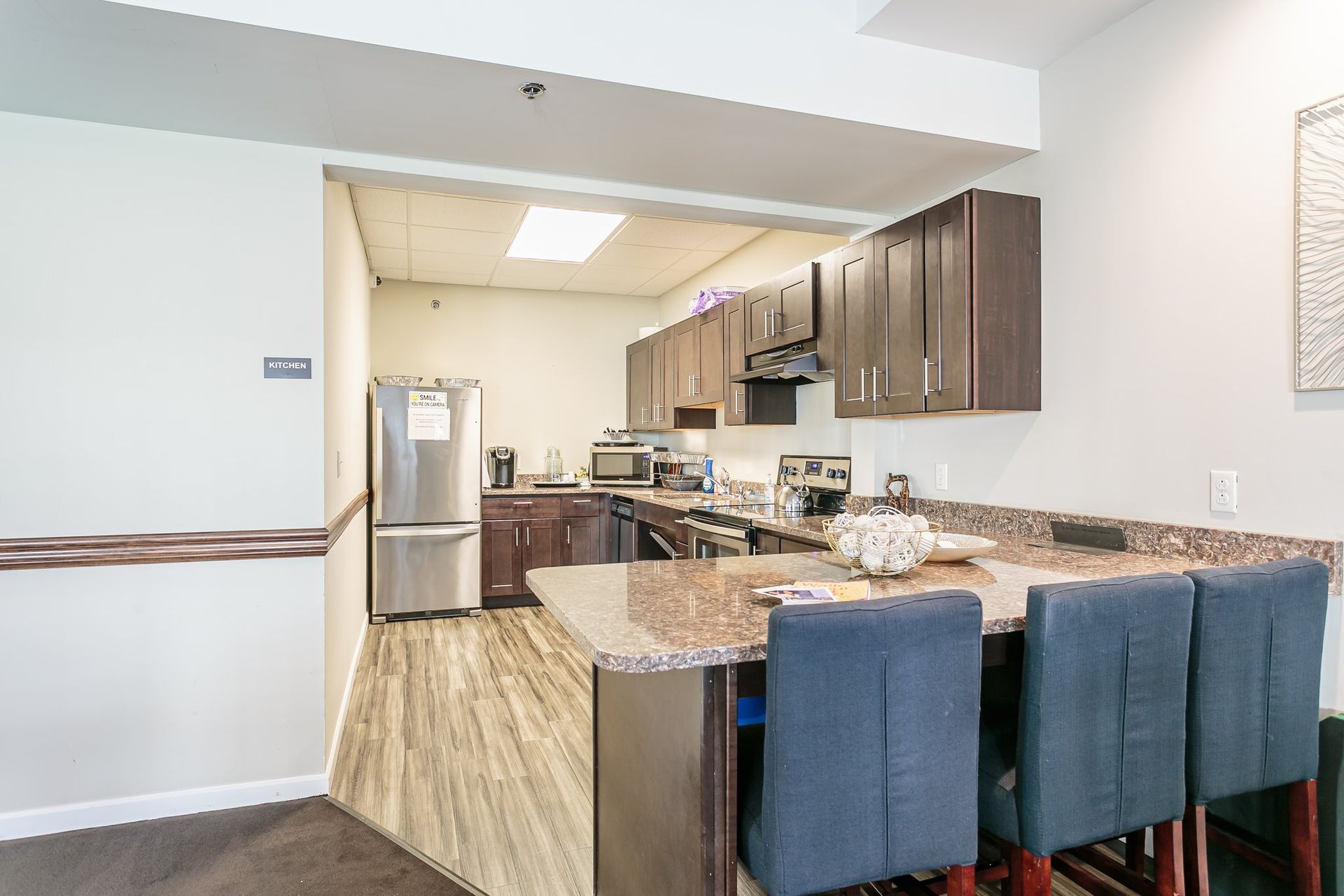 Kitchen with modern appliances and breakfast bar