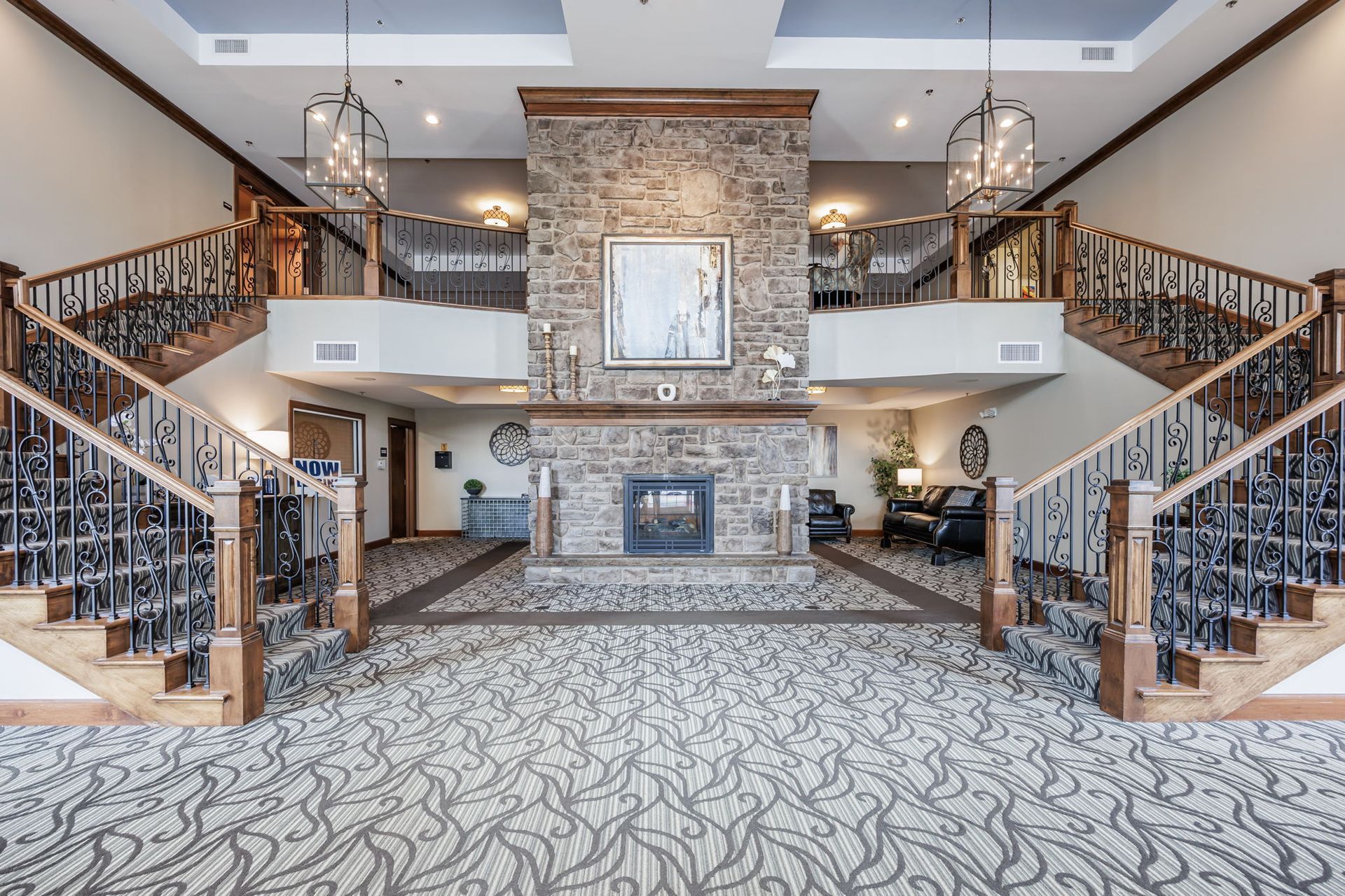 Belvedere foyer and main stairs with fireplace
