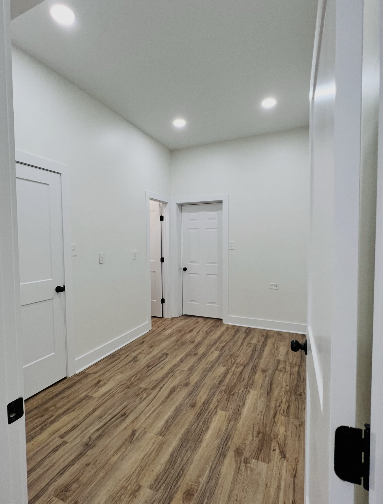 Custom finish carpentry and built-in storage installed by Proverbs Construction in a Fayetteville TN bedroom remodel.