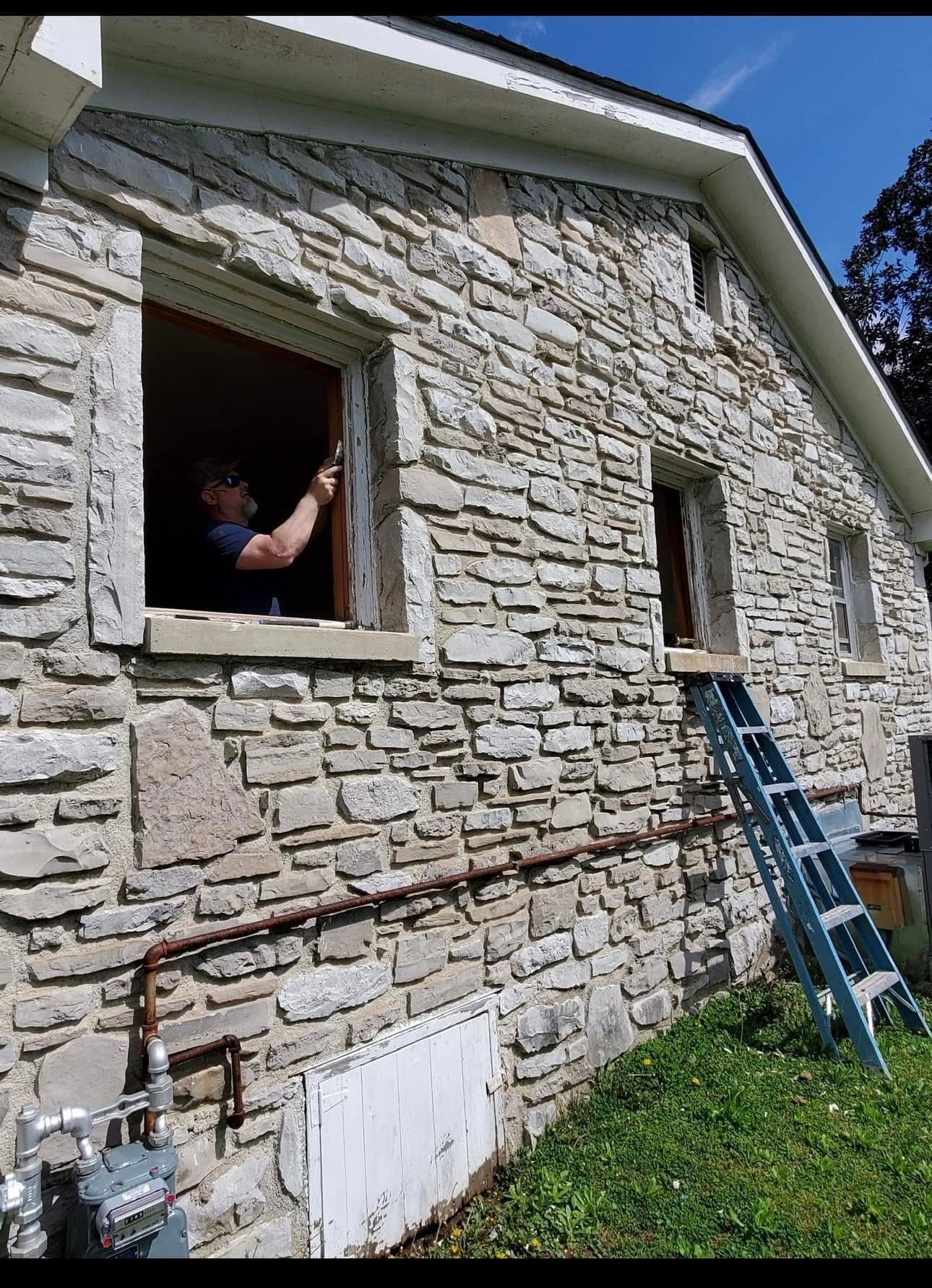 New energy-efficient replacement window installed in a Fayetteville, TN home letting in warm daylight.