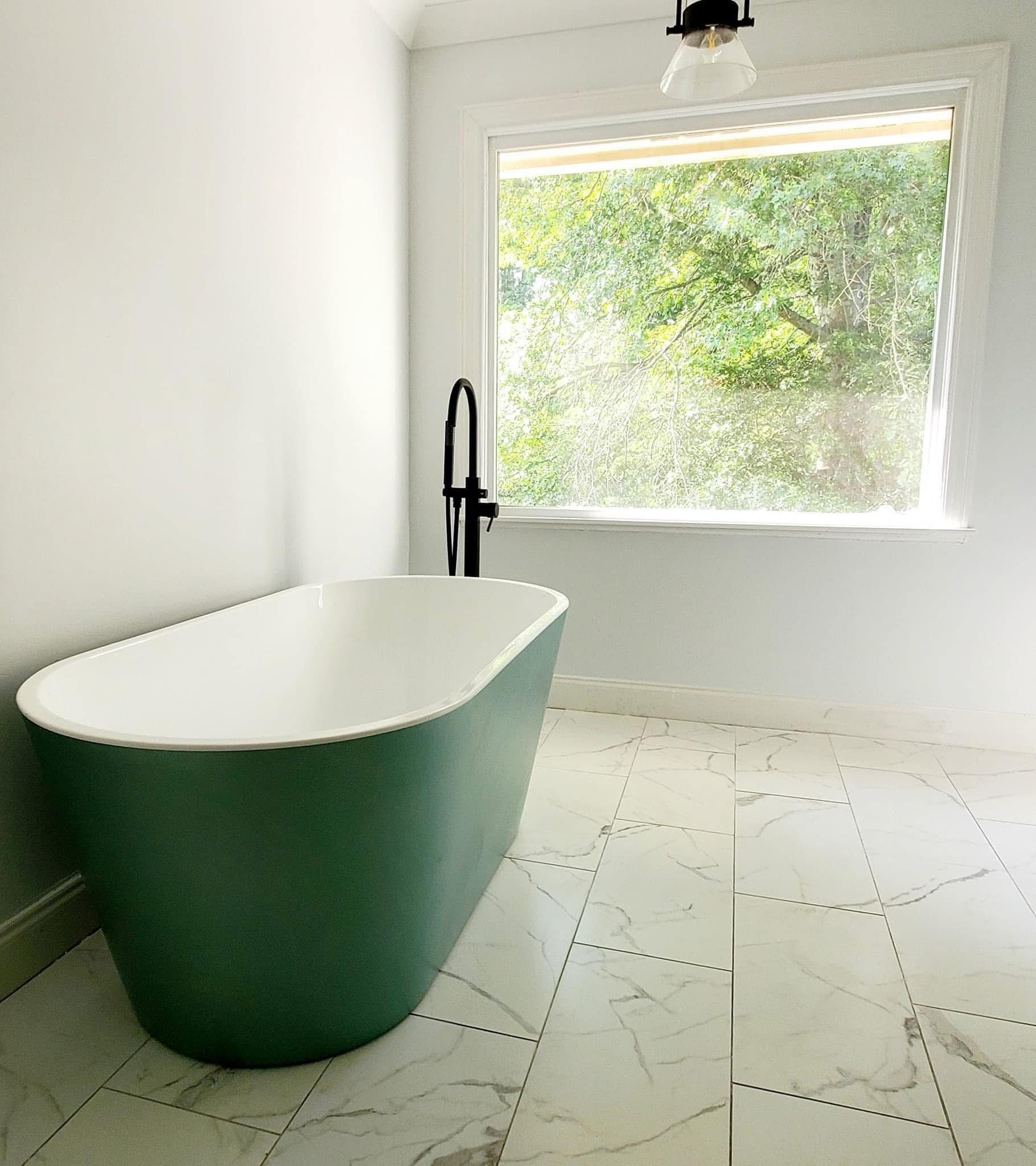 Updated bathroom with new tile shower and vanity in a Lincoln County, TN home