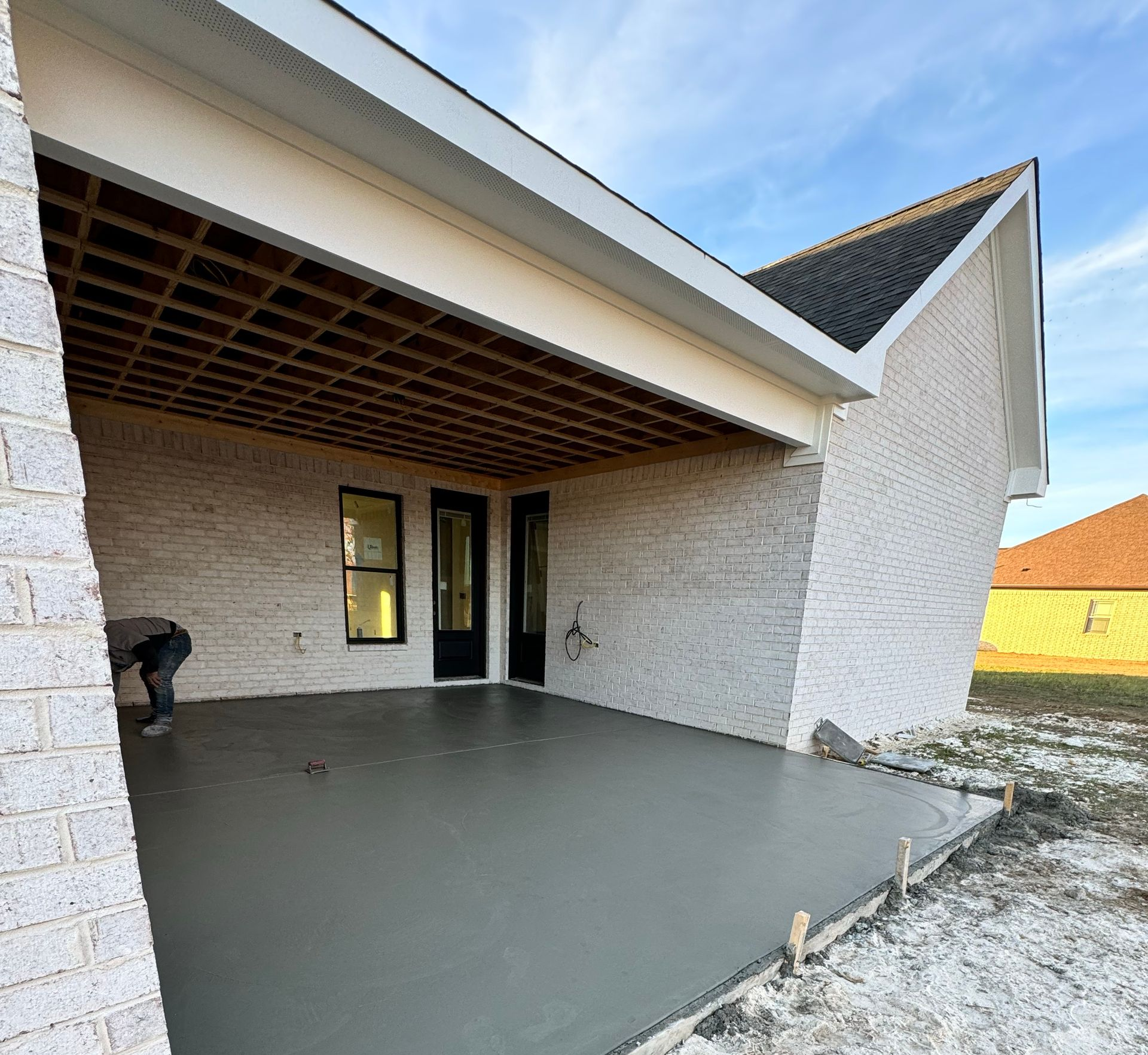 Covered front porch addition on a brick single-family home in Fayetteville, TN