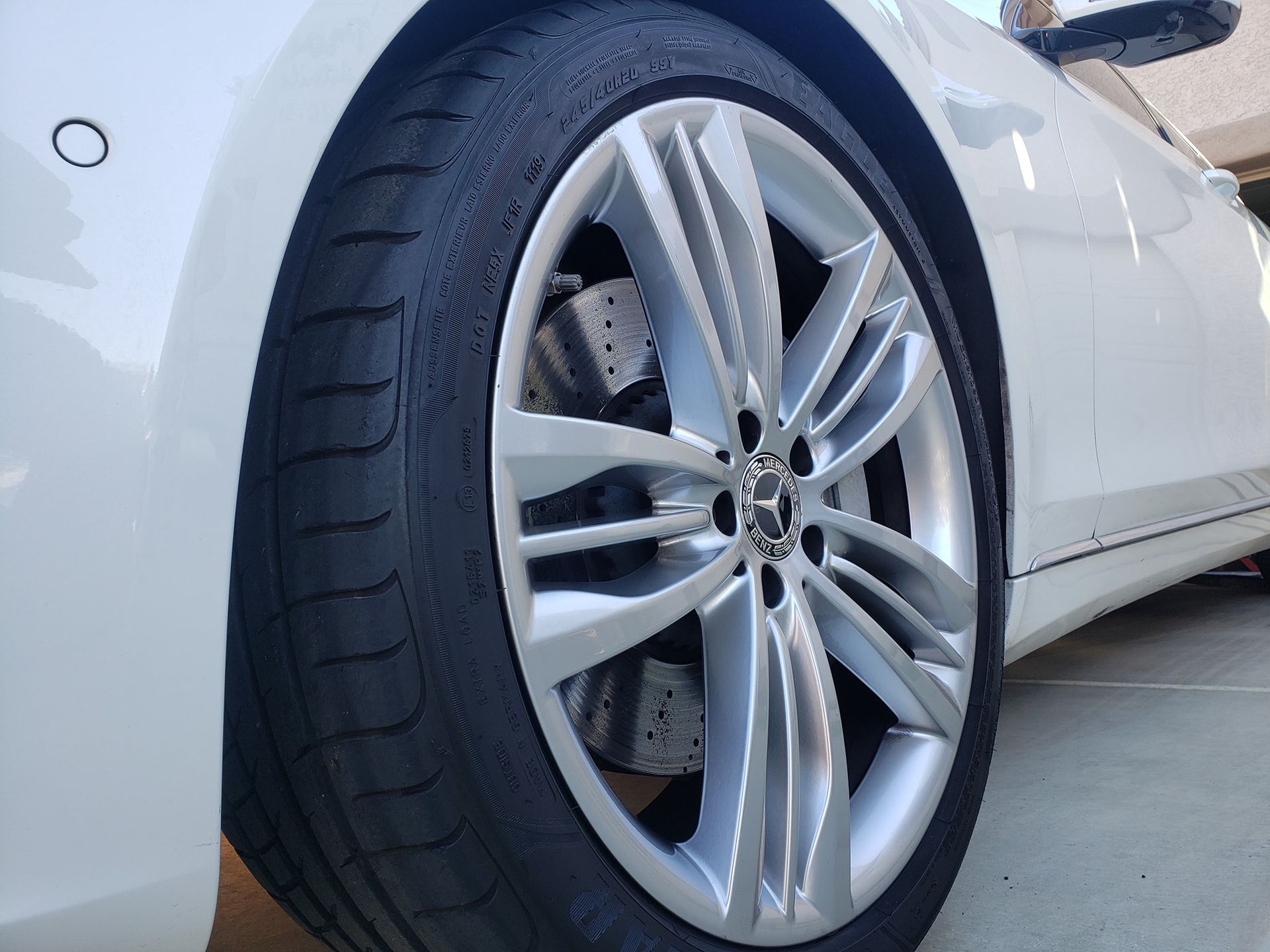 a close up of a car wheel with a tire on it