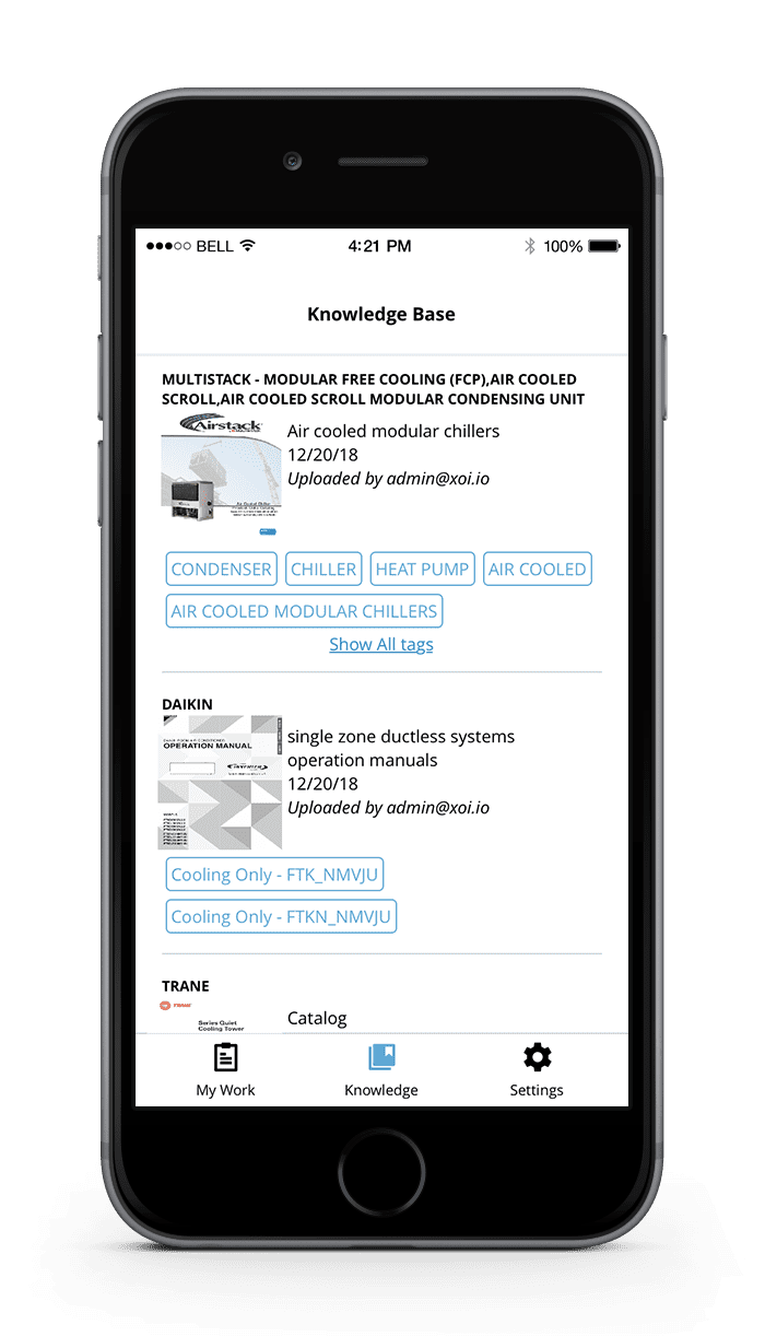 Black iPhone displaying a white app screen with text, small images, and blue buttons or links