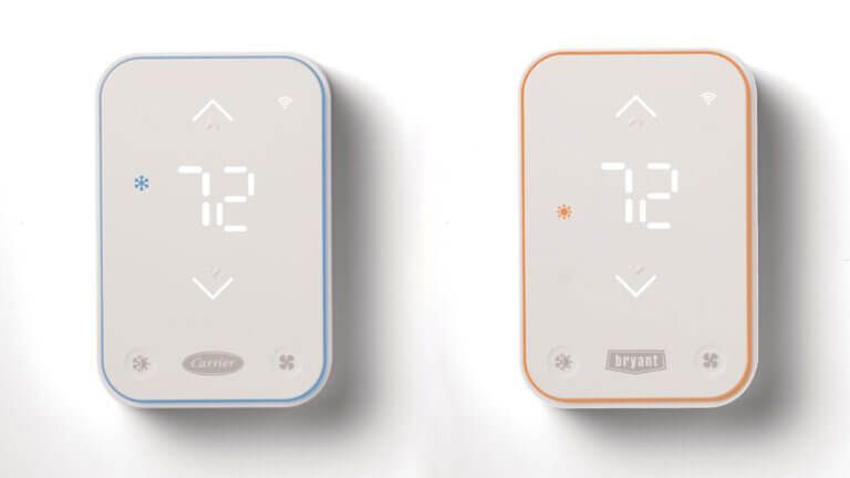 Two minimalist thermostats side by side, one cool gray and one warm beige, both showing 72°.