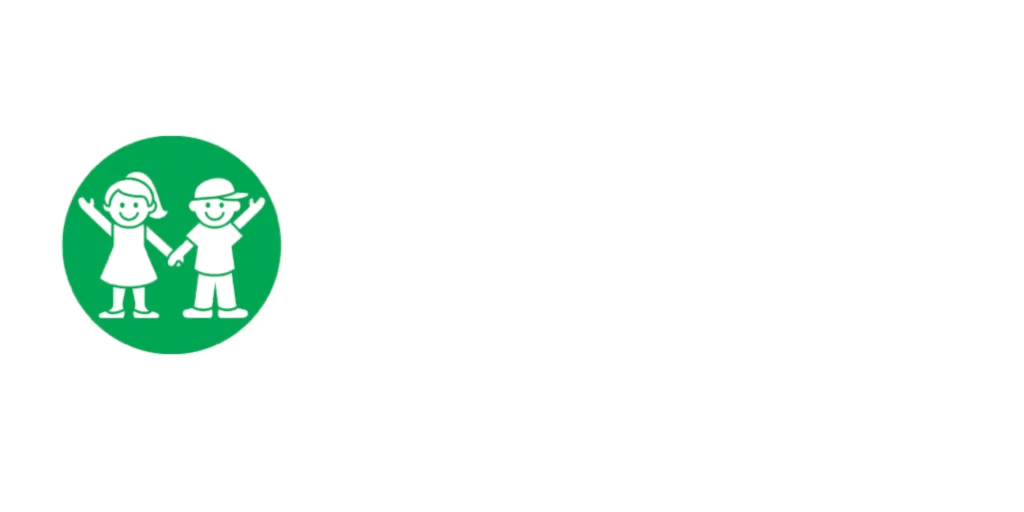 Two white child figures in a green circle, holding hands and smiling.