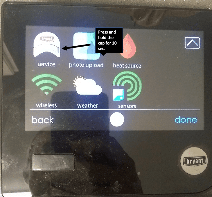 Black touchscreen HVAC control panel with service, photo upload, heat source, wireless, weather, and sensor icons