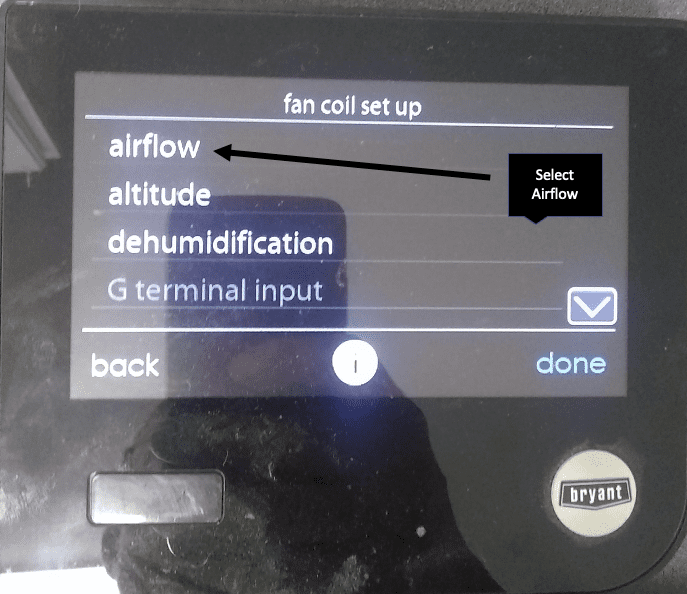 HVAC touchscreen menu showing fan coil setup options for airflow, altitude, dehumidification, and G terminal input