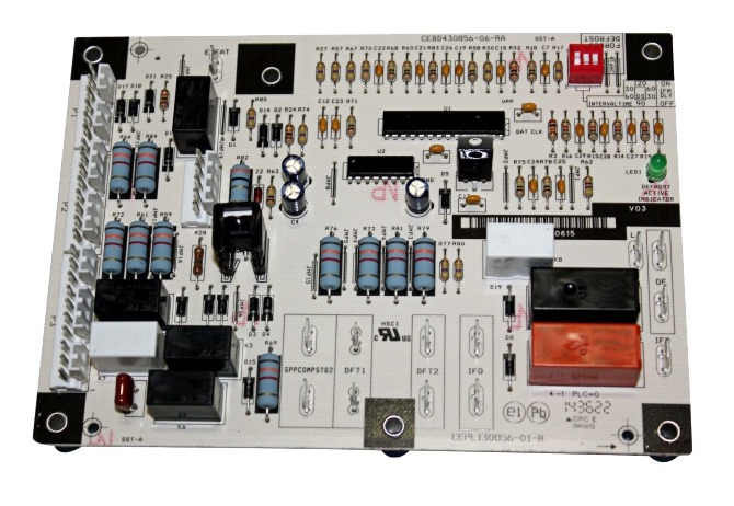Electronic circuit board with resistors, capacitors, relays, and connectors on a white panel