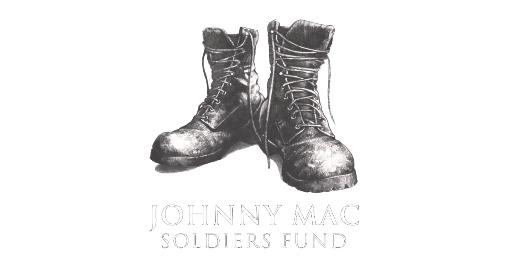 Black combat boots above the text “Johnny Mac Soldiers Fund”