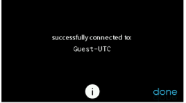 Black confirmation screen saying “successfully connected to Guest-UTC” with a Done button and info icon