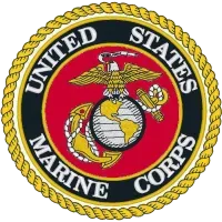 United States Marine Corps emblem with gold rope border, eagle, globe, and anchor on red and black background