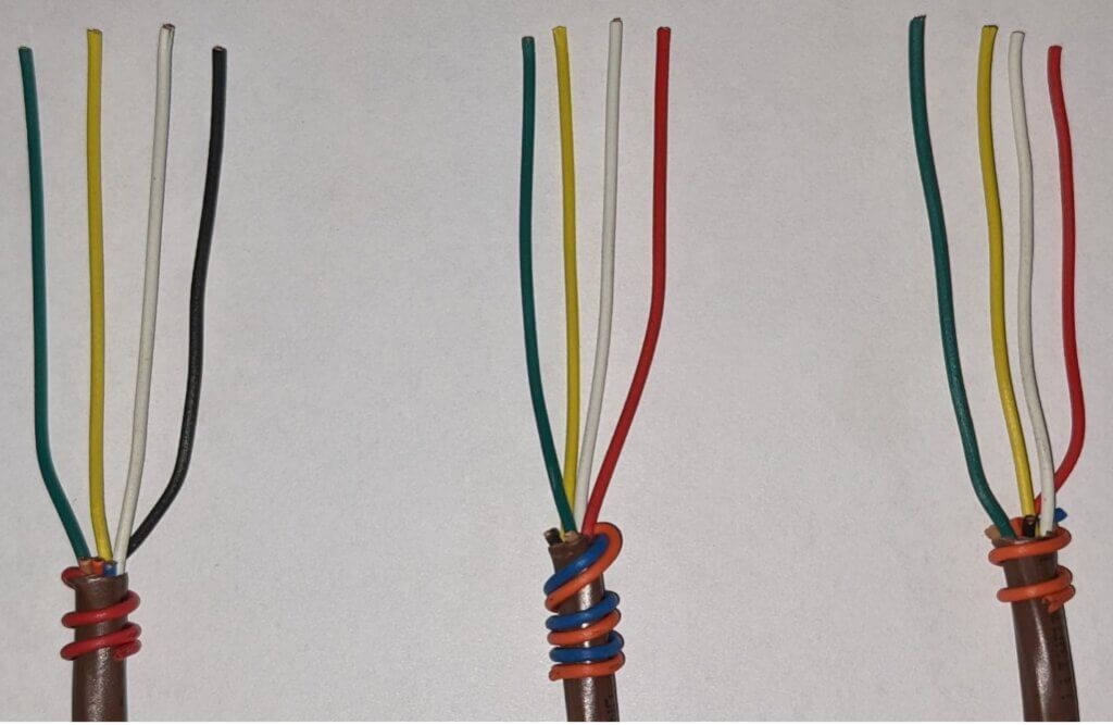 Three wire bundles with colored strands and red, blue, and orange ties on white background
