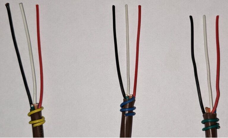 Three pairs of insulated wires held together with colored zip ties, shown side by side.