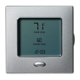 Silver digital thermostat display showing 71° inside temp, 60° outside temp, and 12:03
