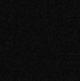 Nearly black, low-contrast image with faint diagonal gray streaks