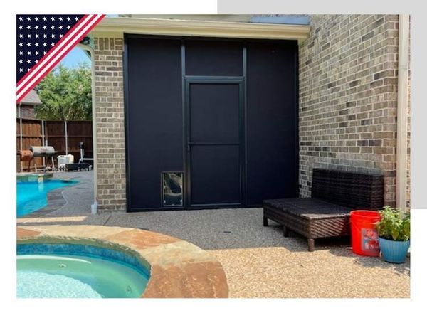 Black outdoor screens with a pet door, a patio setting, and a swimming pool.