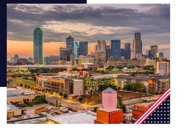 Dallas, Texas skyline at sunset with blue and orange hues.