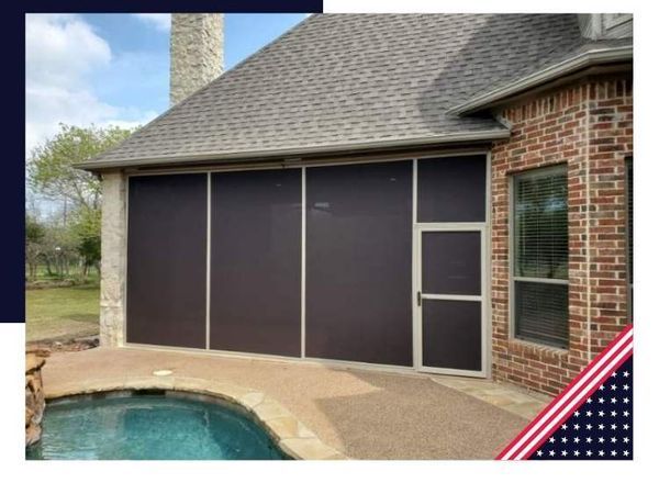 Screened patio overlooking a pool. Brown screens, tan trim, brick house.