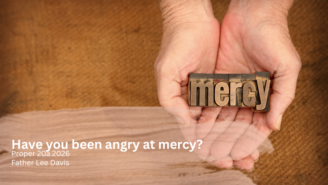 hand holding the word mercy