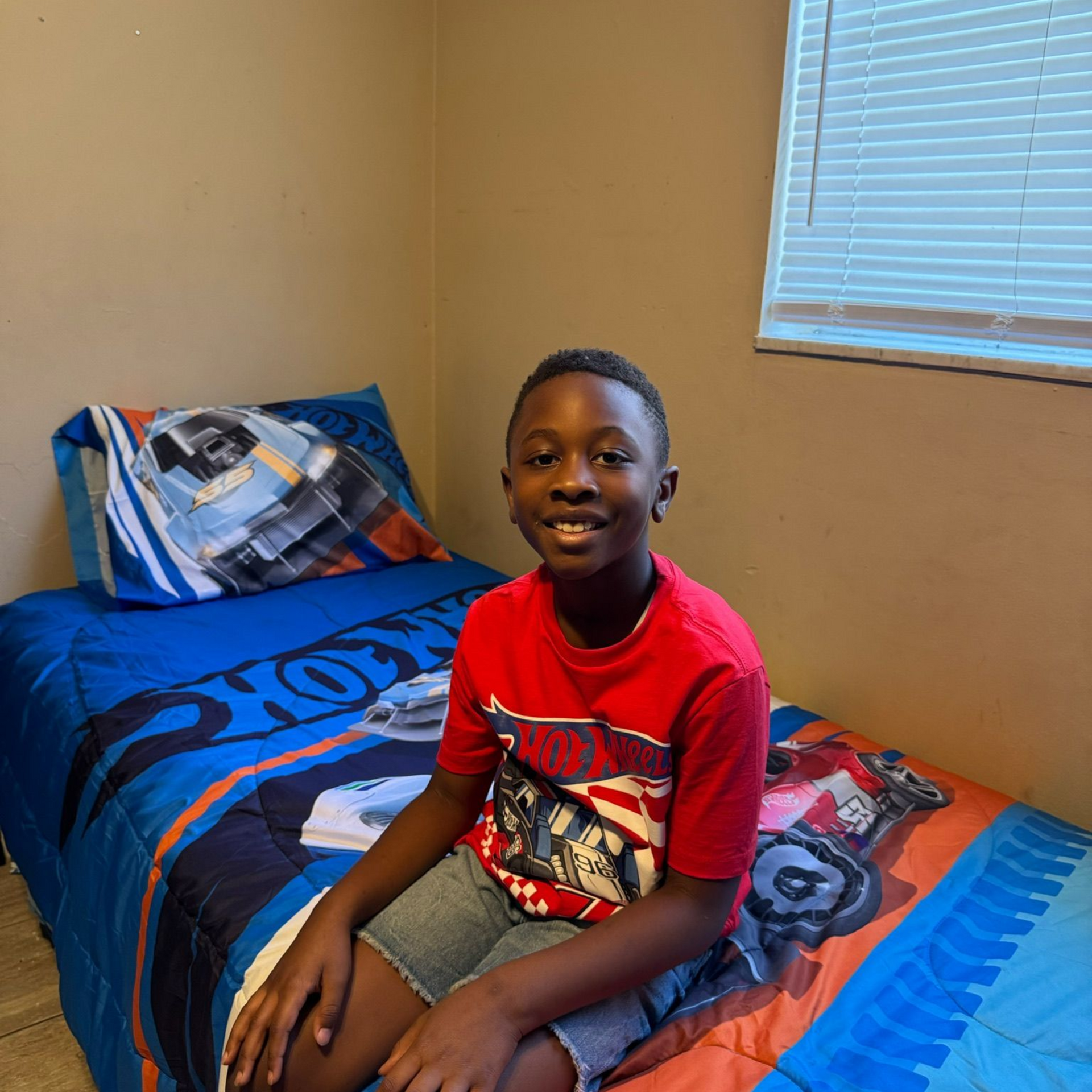 picture of boy on new bed