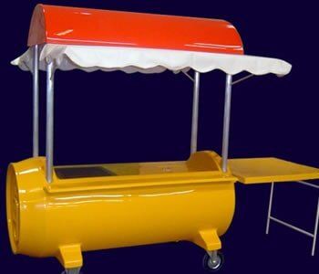Carrito de ventas o quiosco móvil fabricado en fibra de vidrio color amarillo.
