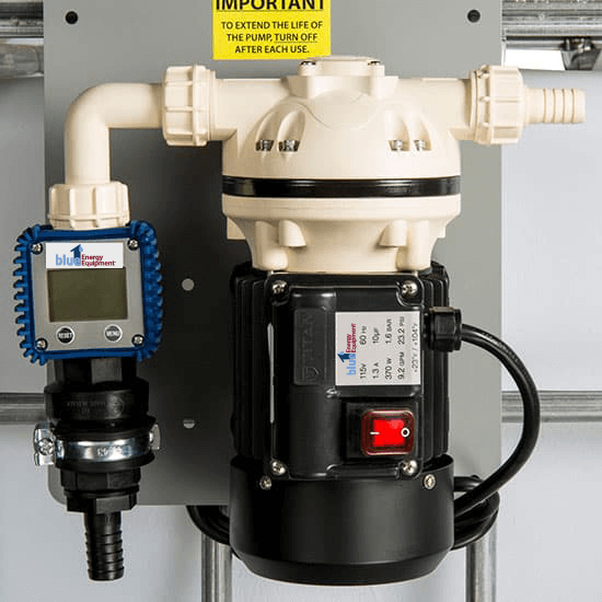 Industrial pump assembly with black motor, white housing, and blue digital sensor gauge.