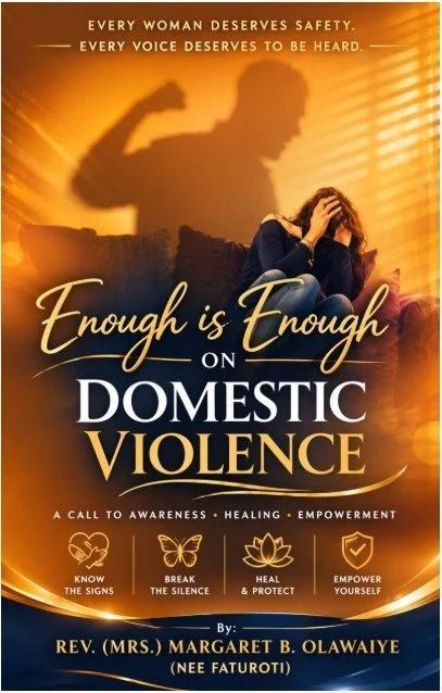 Orange poster reading “Enough is Enough on Domestic Violence” with support contact icons and a silhouetted woman