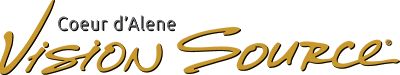 Logo for Coeur d'Alene Vision Source in gold cursive script with a brown swirl and a small dot.