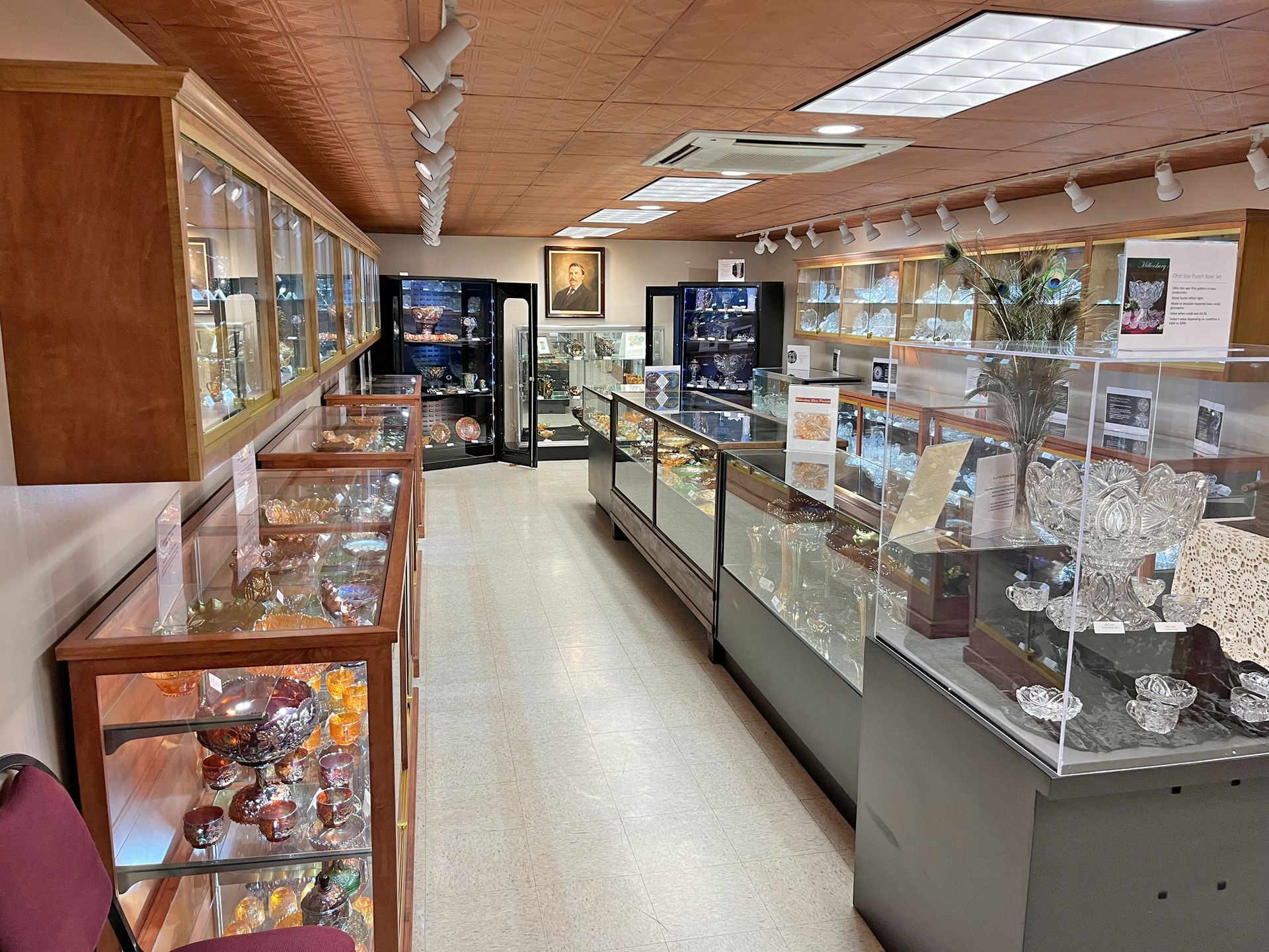Inside a jewelry store with display cases filled with items.