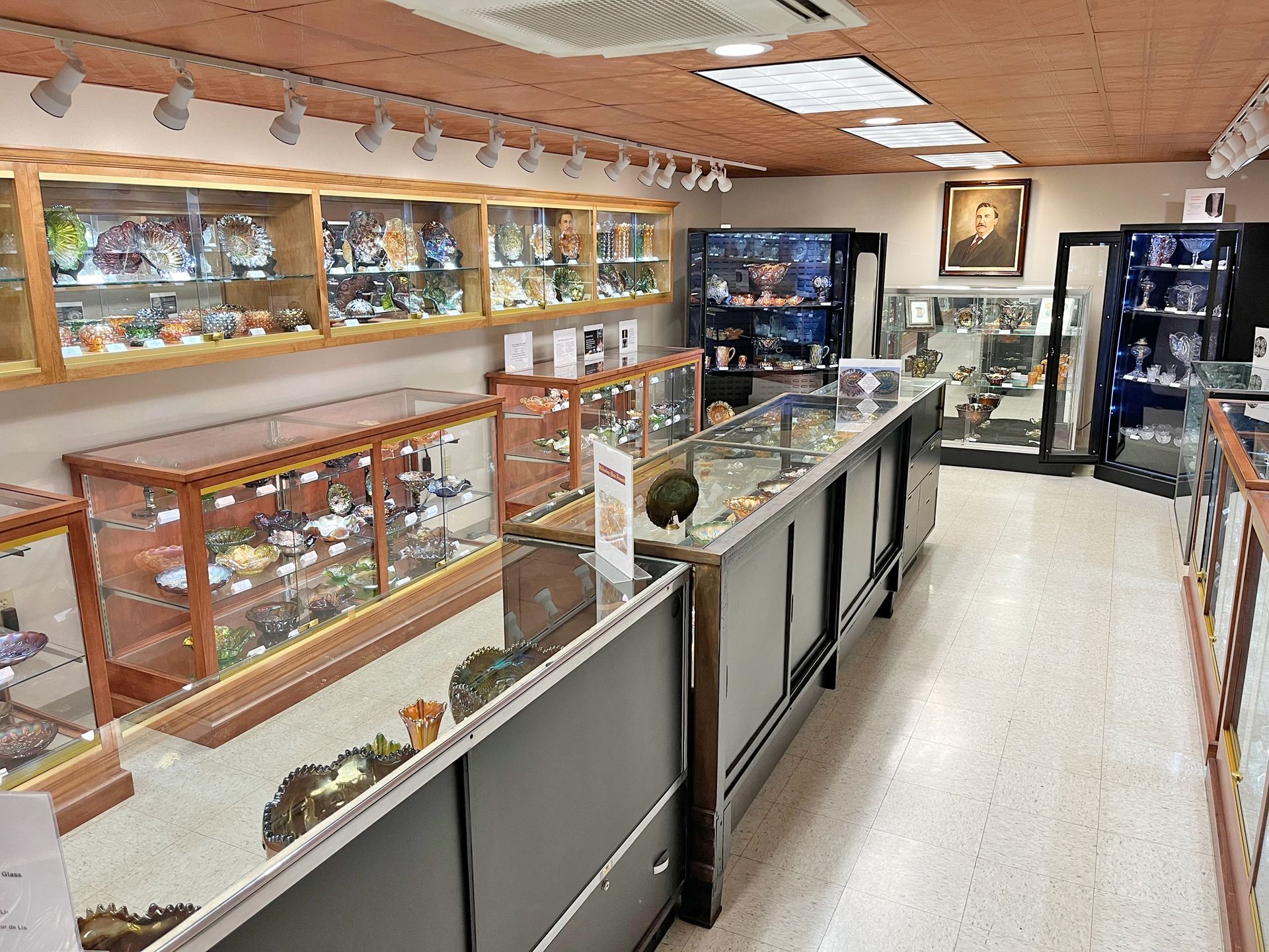 Interior of a jewelry store with display cases filled with jewelry.
