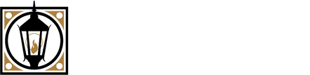 Logo of a black gas lantern within a circle, in a tan square with dots.