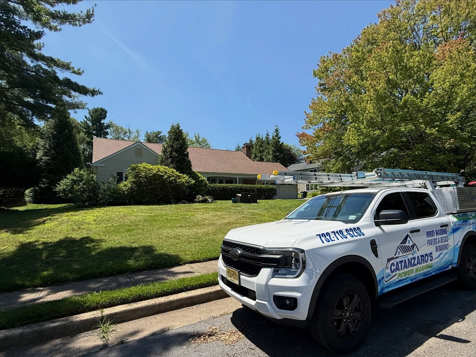 Branded truck at ranch house — Catanzaro's Power Washing