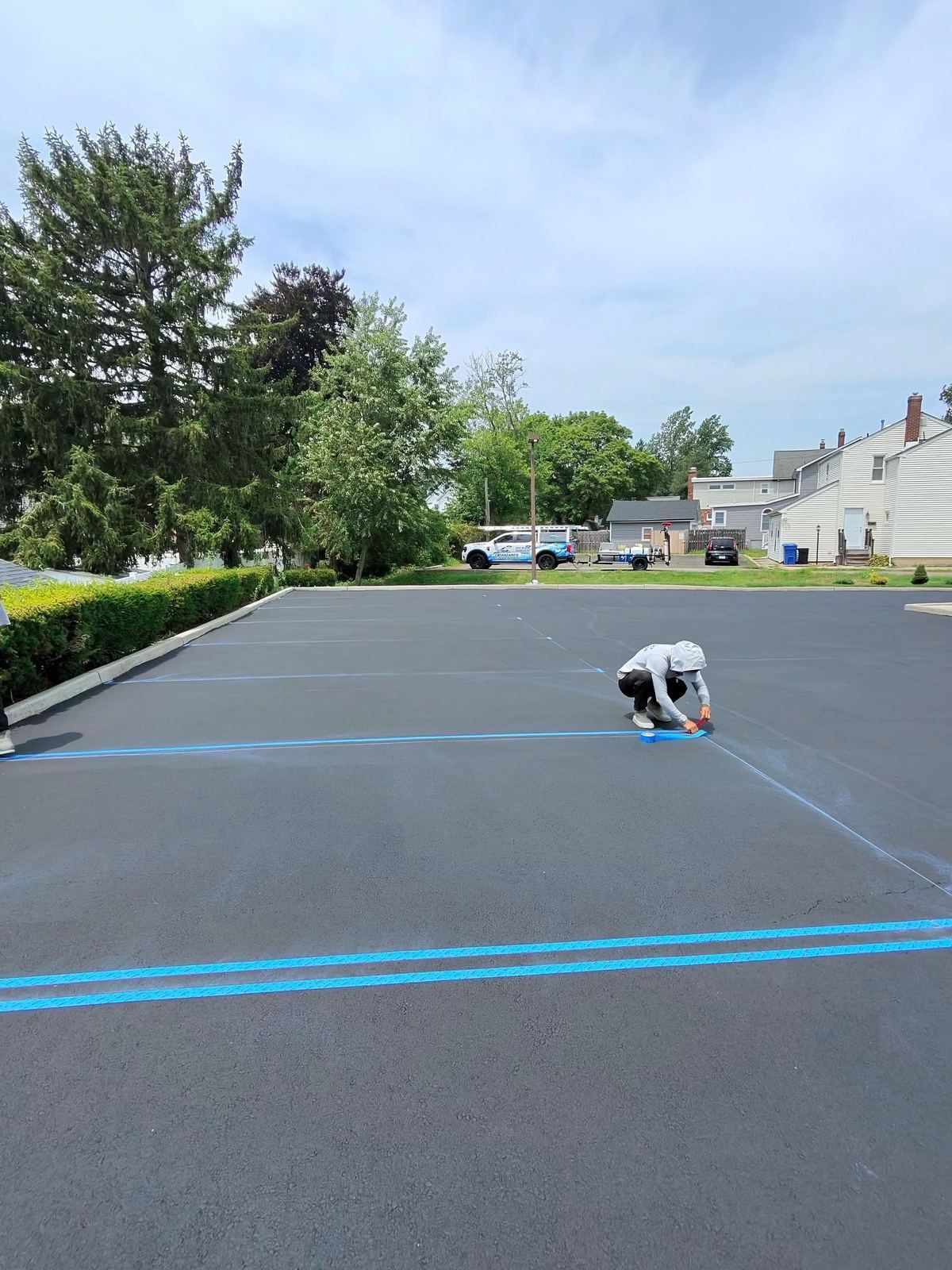 Crew laying out parking lot lines — Catanzaro's Power Washing