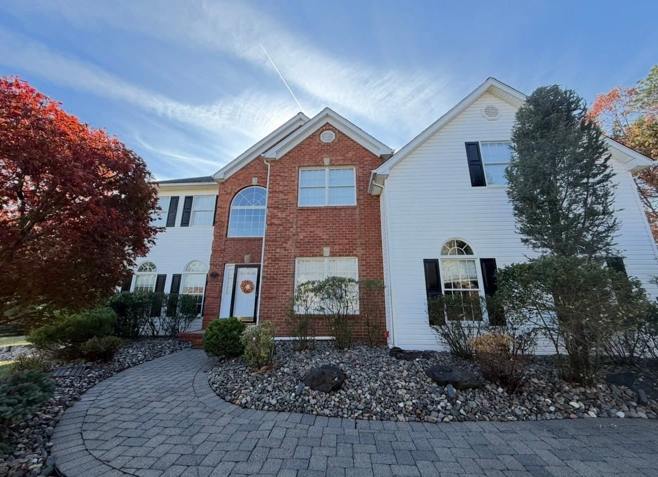 Brick-and-white colonial with paver walk — Catanzaro's Power Washing
