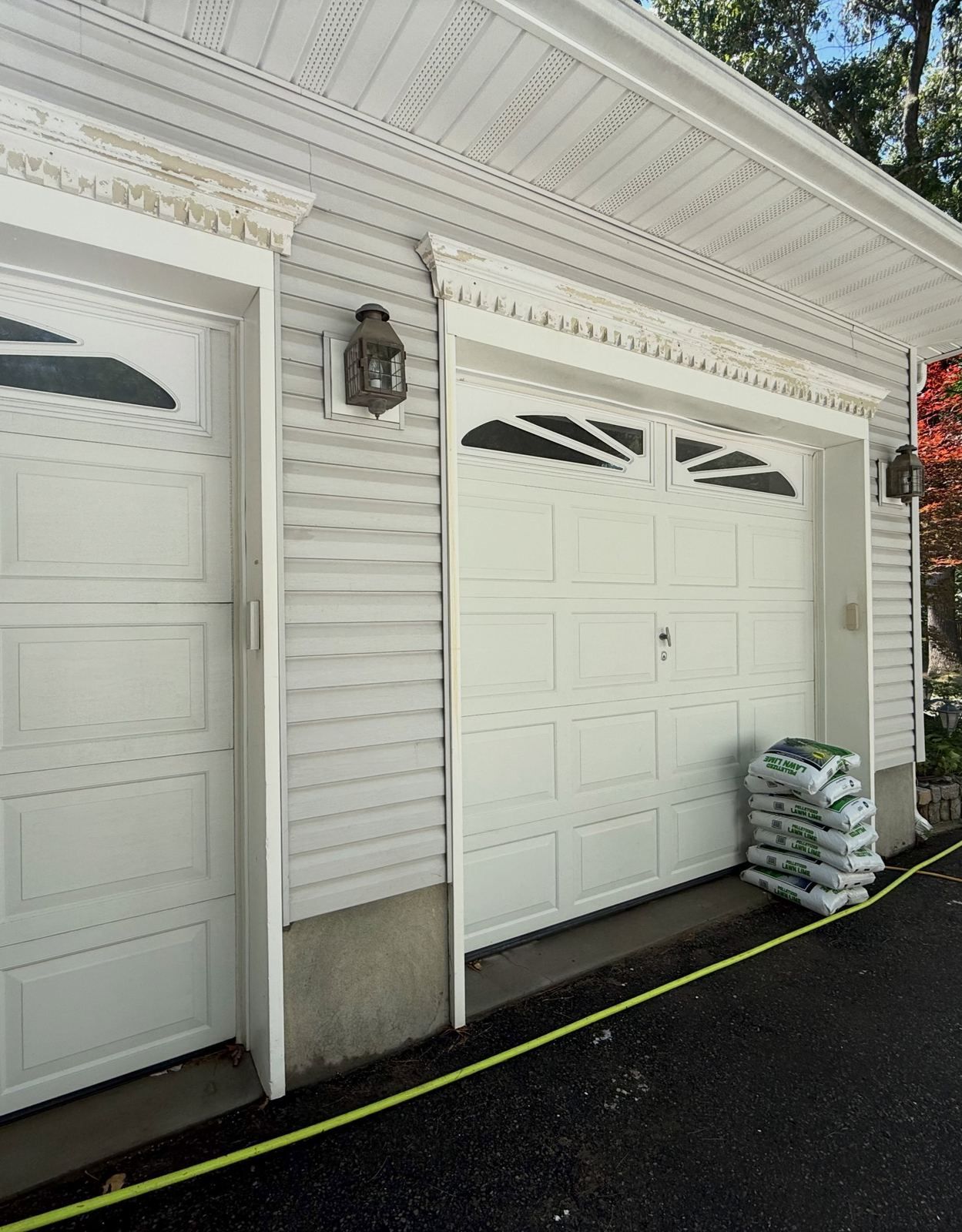 Garage doors and driveway — Catanzaro's Power Washing