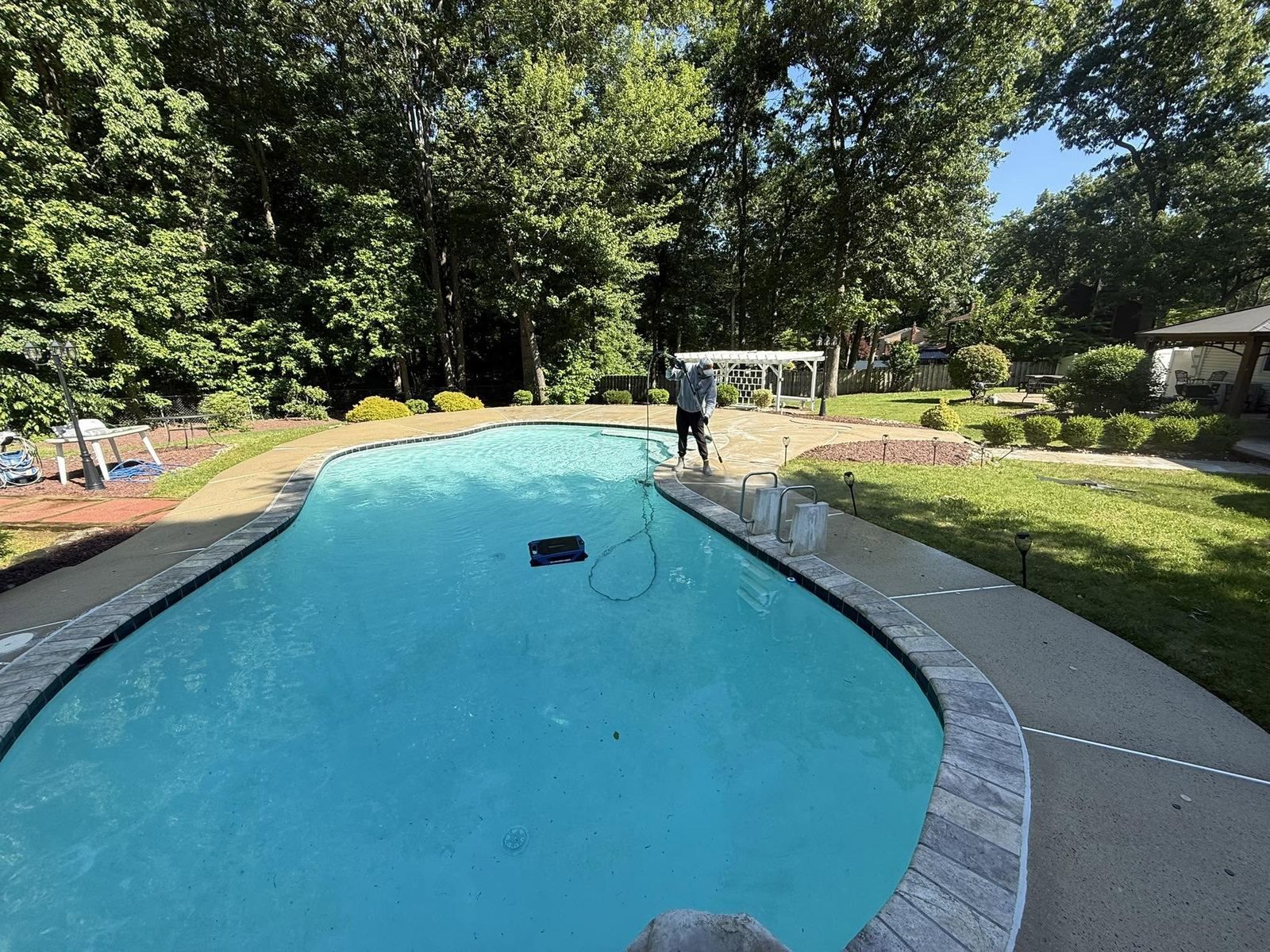 Pool and coping, crew washing deck — Catanzaro's Power Washing
