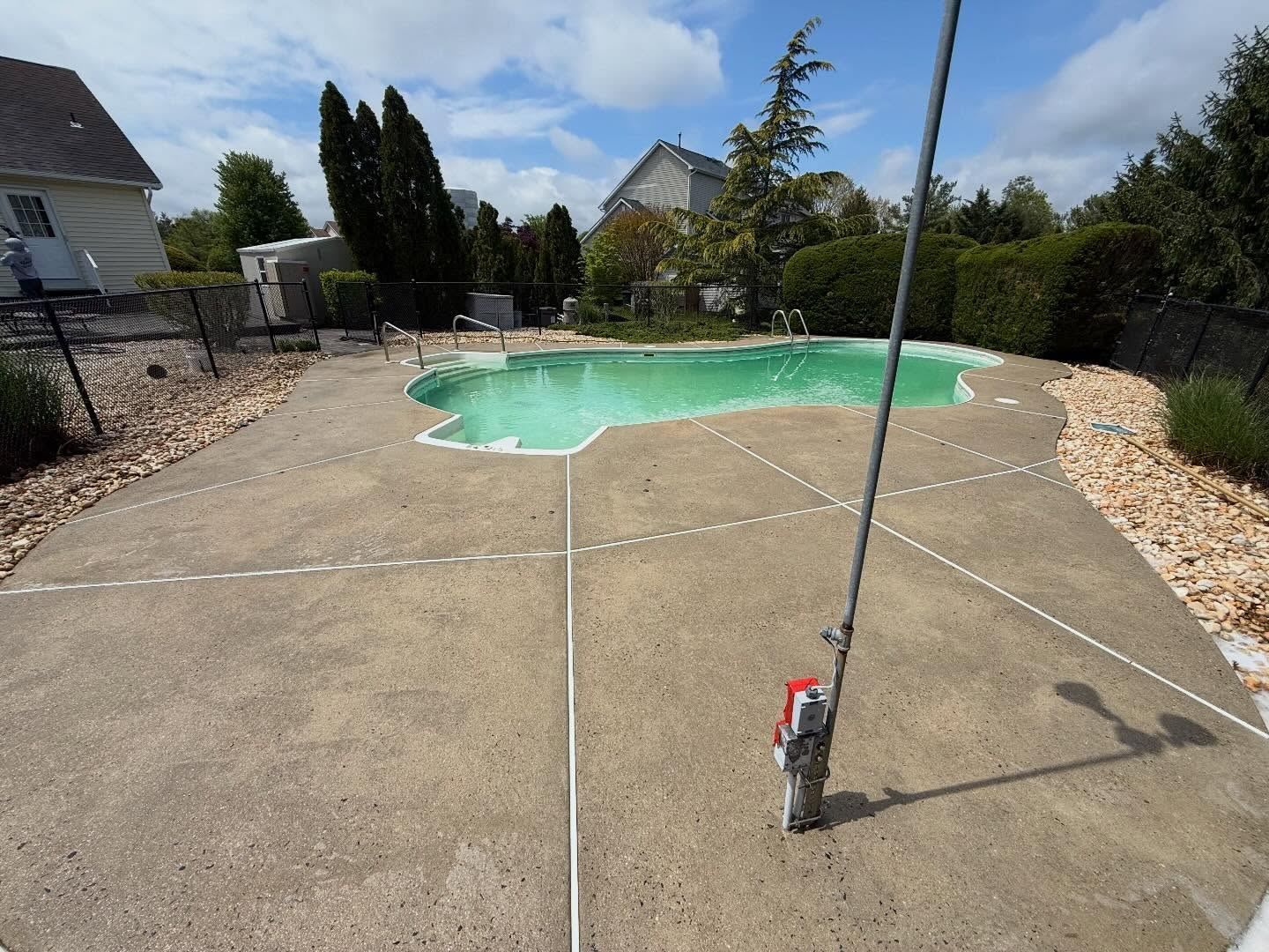 Pool deck concrete being washed — Catanzaro's Power Washing