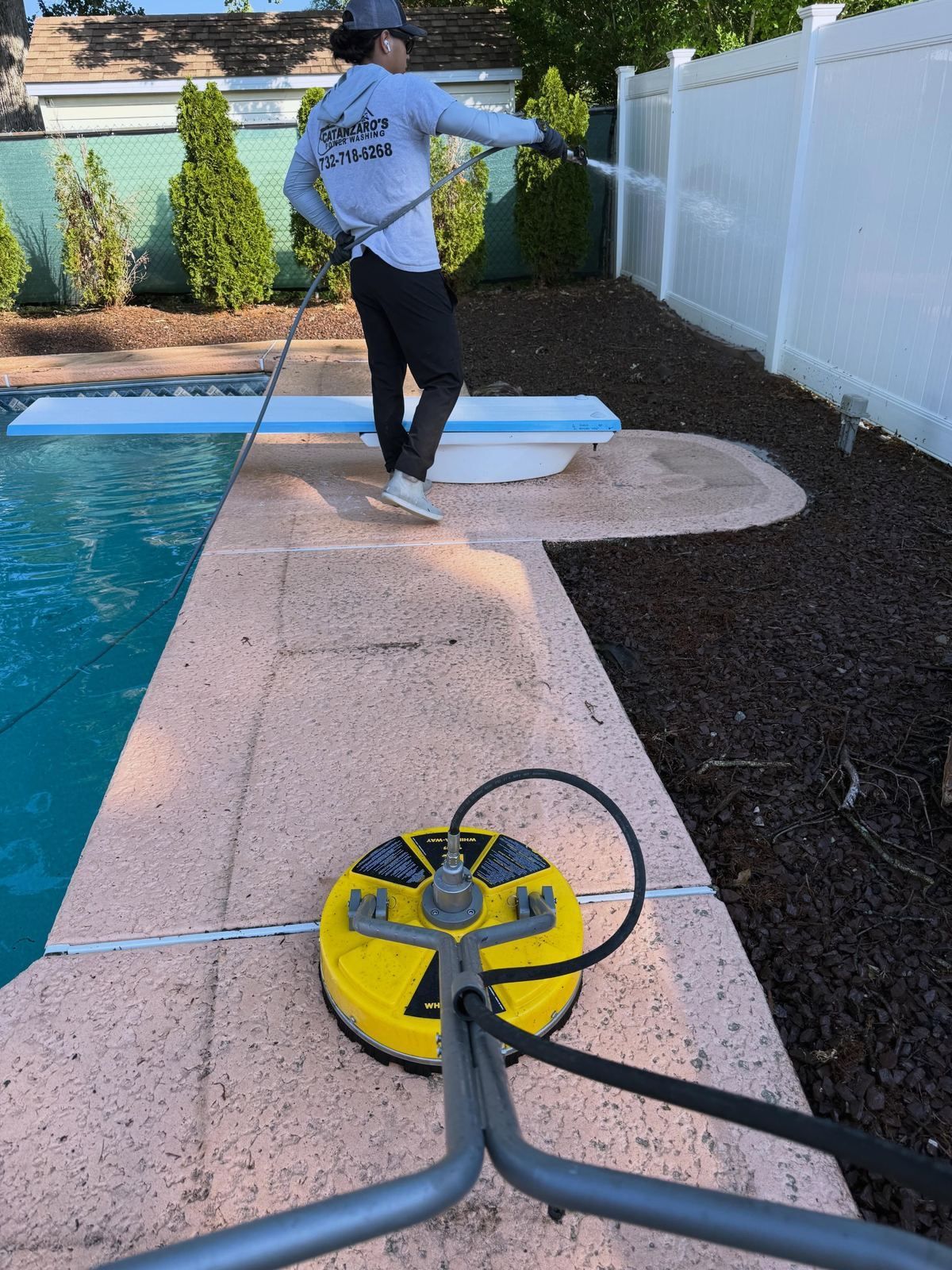 Surface cleaner on pool coping — Catanzaro's Power Washing