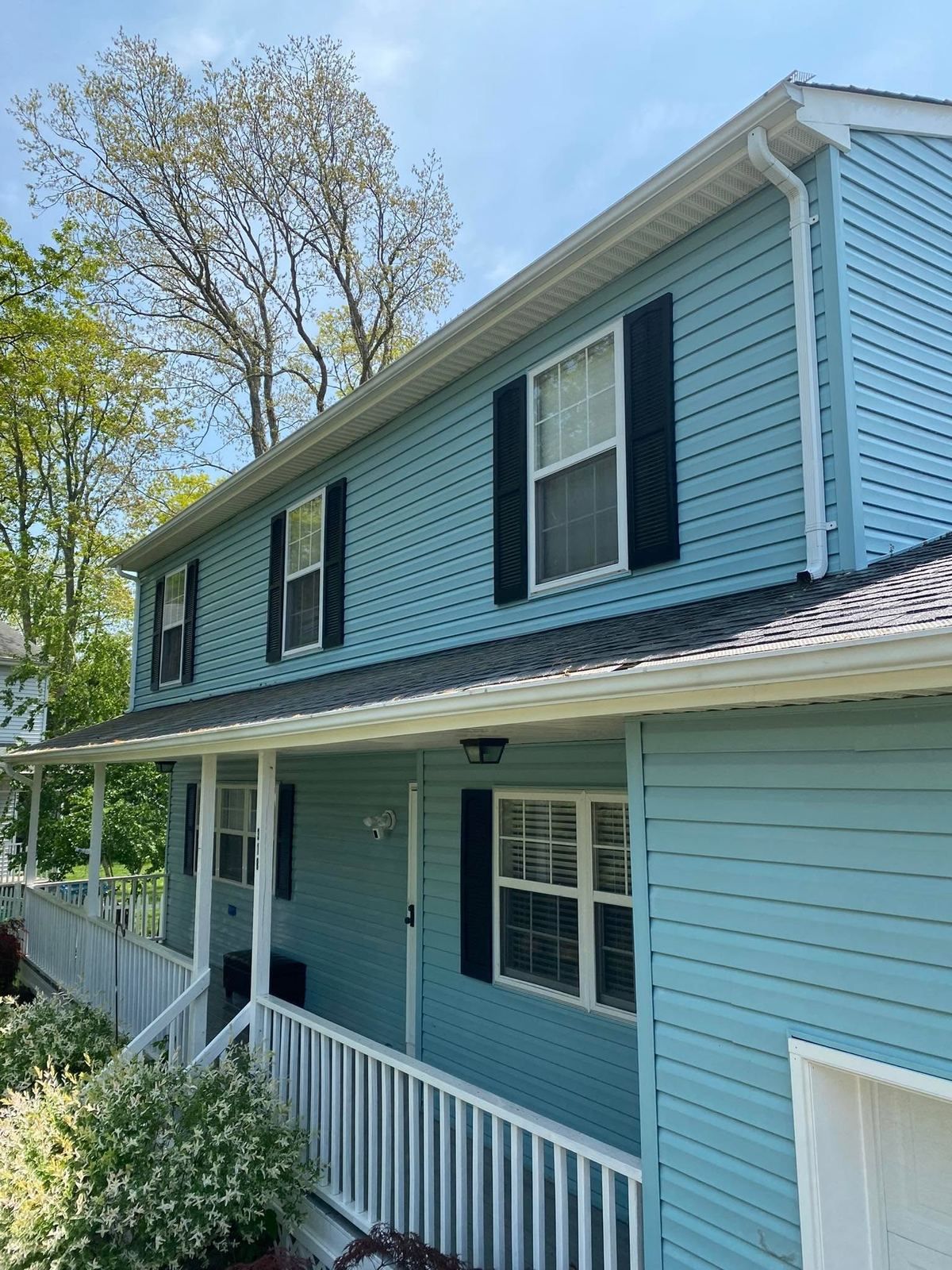 Blue colonial with porch — Catanzaro's Power Washing