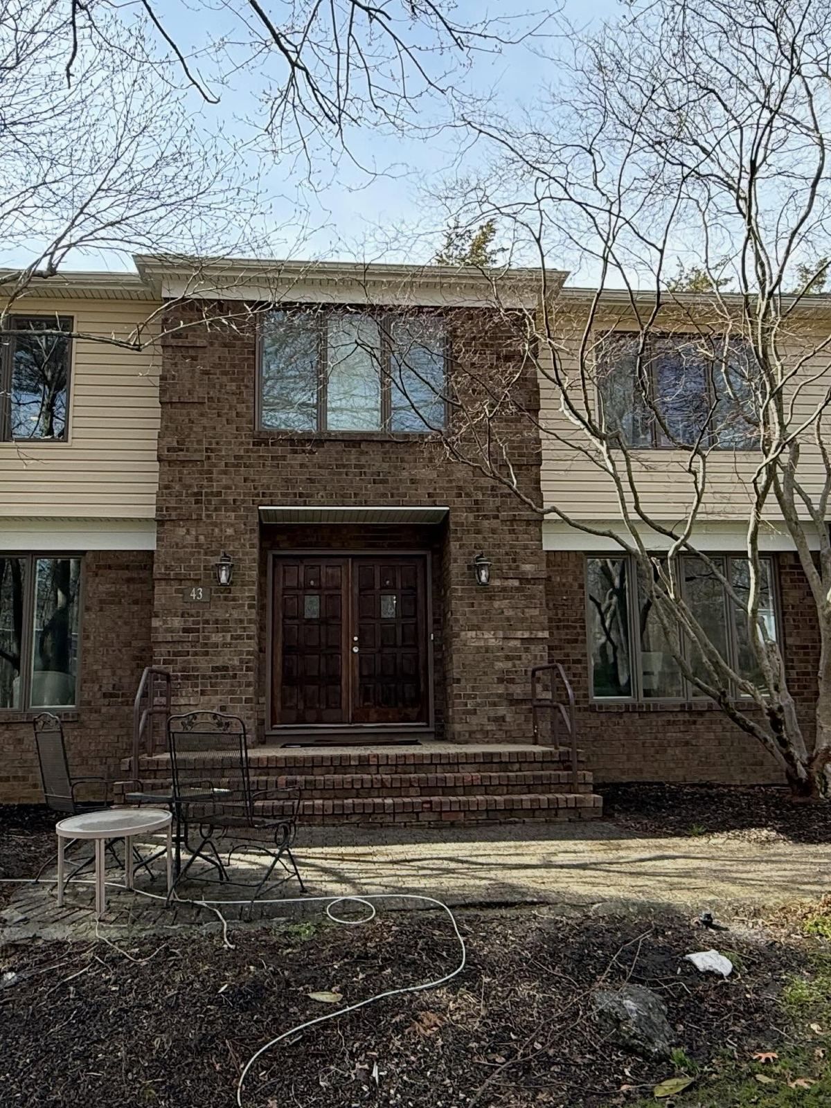 Brick-front colonial entry — Catanzaro's Power Washing