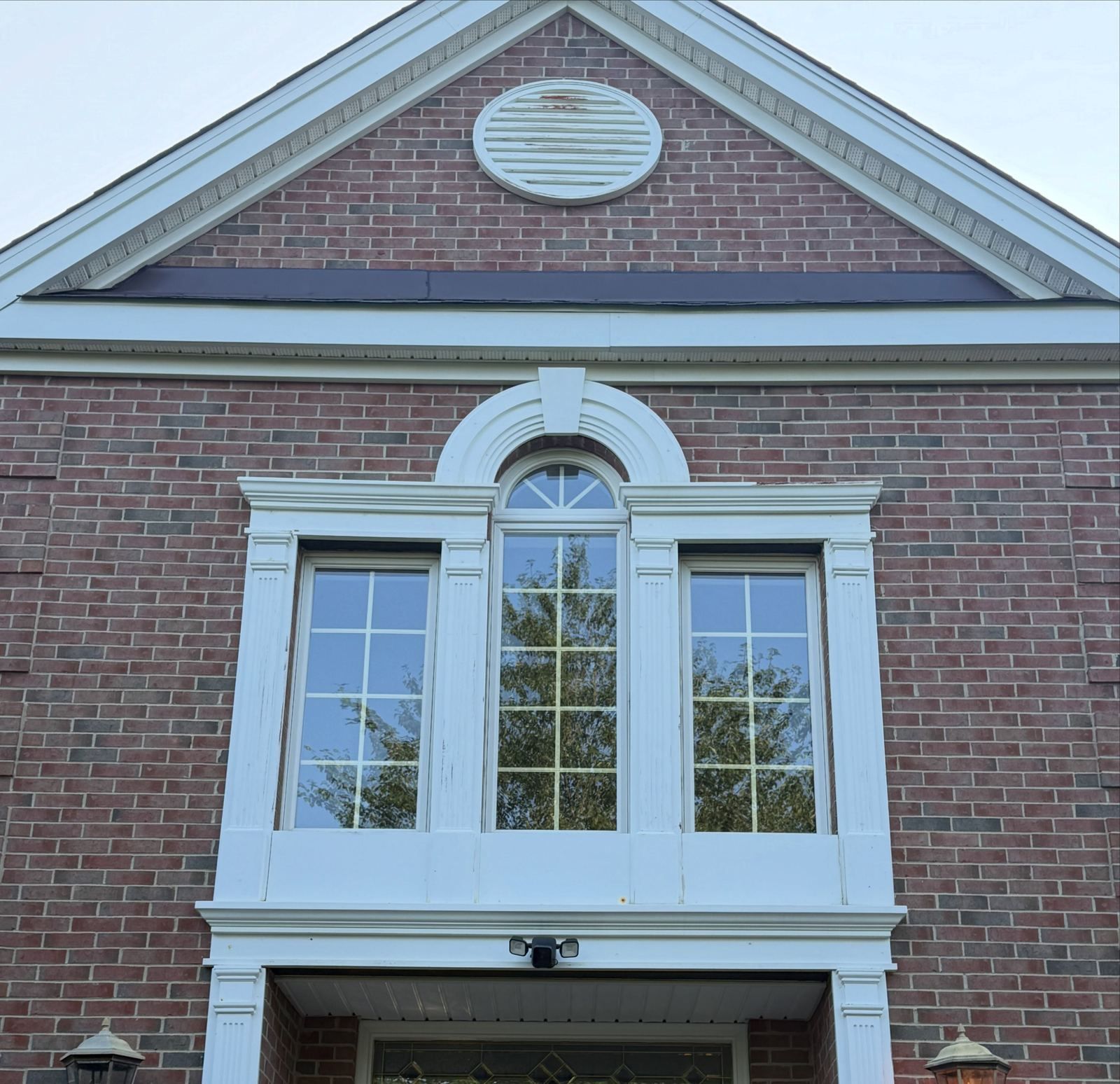 Brick gable with window — Catanzaro's Power Washing