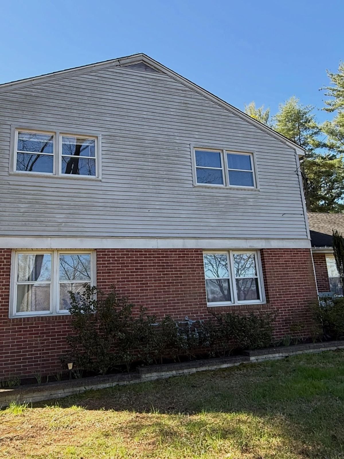 Gable over brick lower floor, washed — Catanzaro's Power Washing