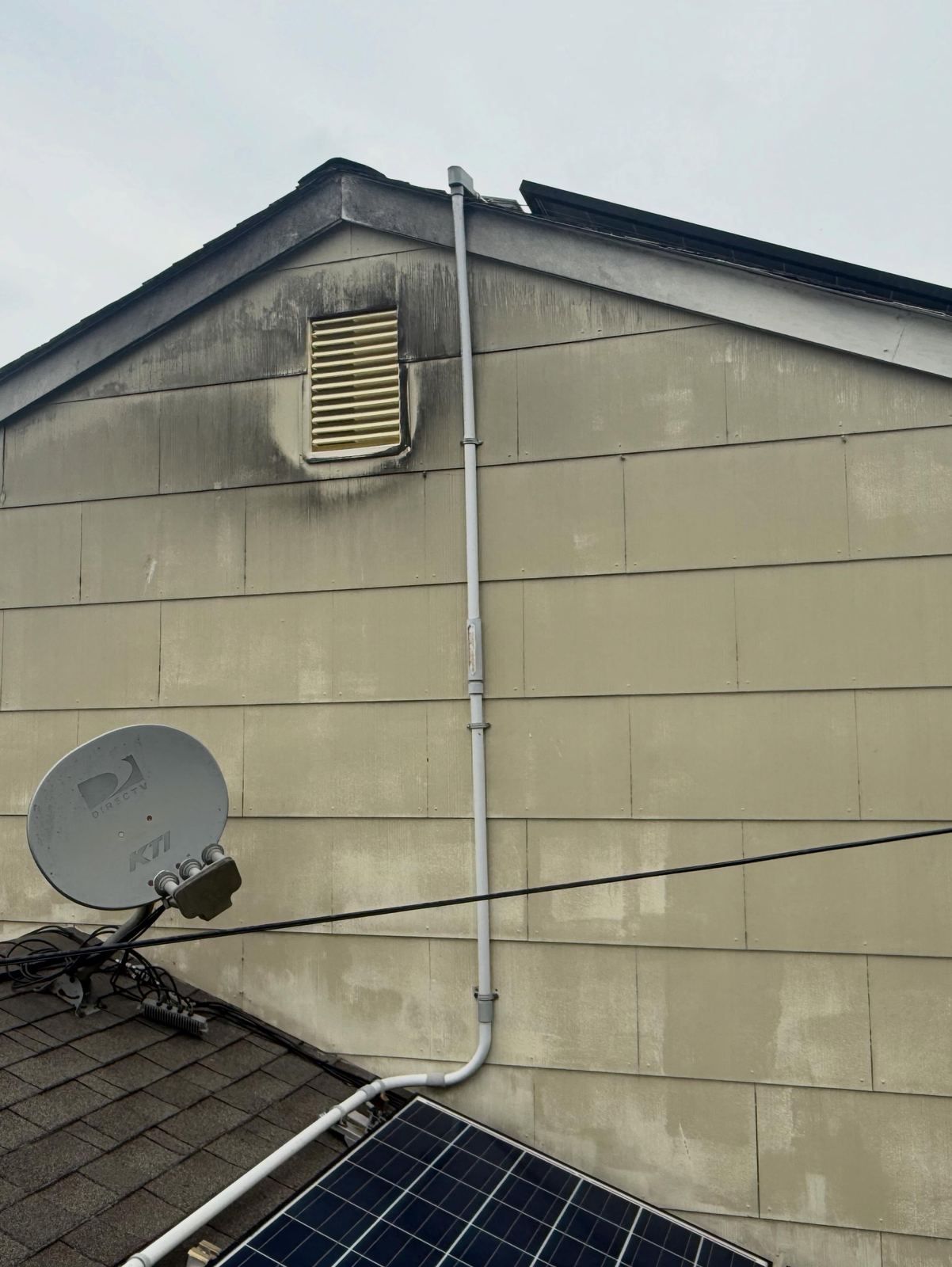 Gable siding with satellite dish — Catanzaro's Power Washing