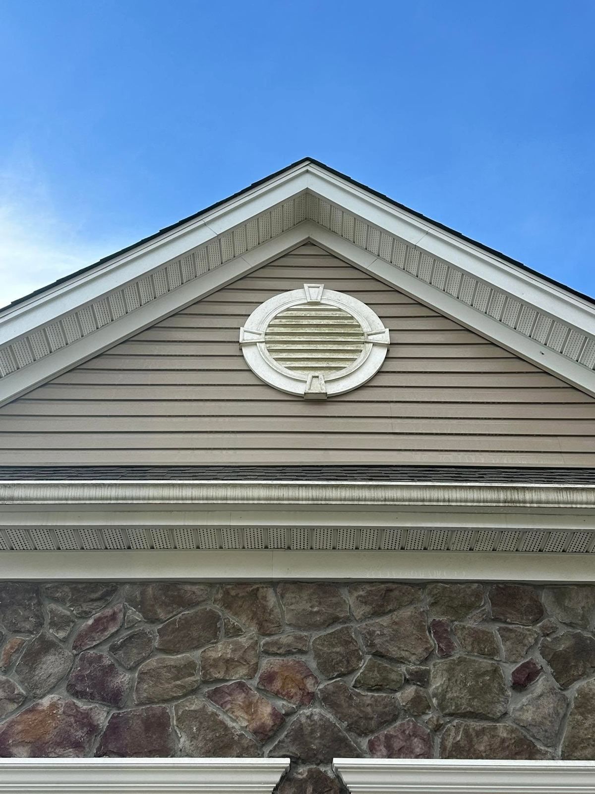Gable vent and stone front — Catanzaro's Power Washing